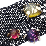 black knitted leather bracelet with colored fused glass cabochons set in silver and gold